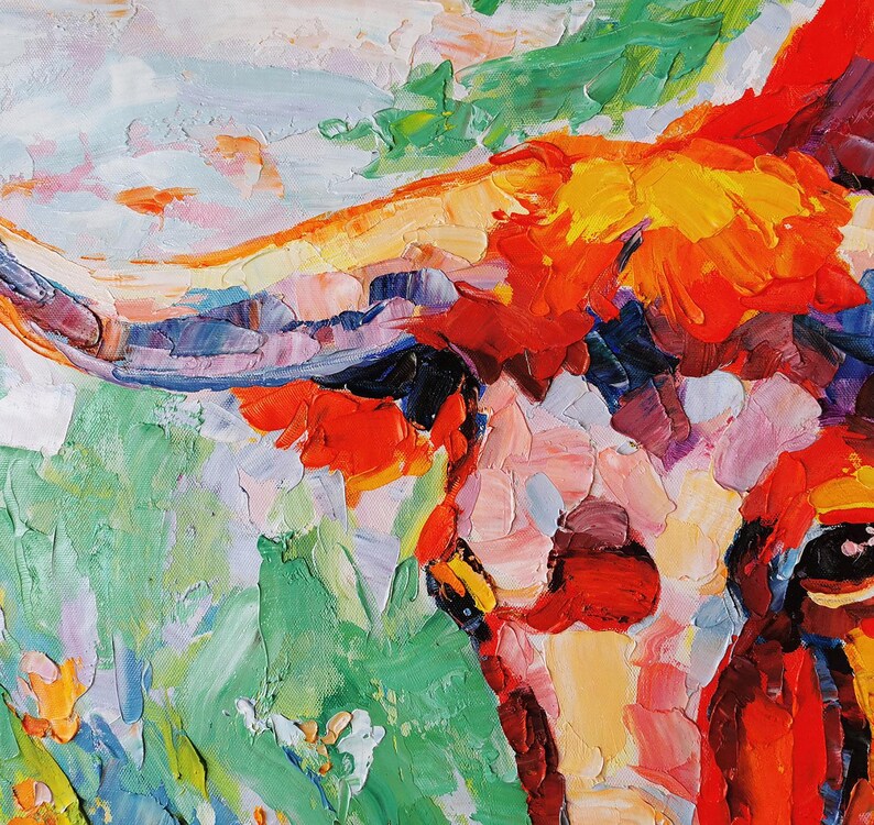May include: Close-up of a vibrant oil painting depicting a longhorn. The artwork features thick brushstrokes in shades of red, orange, yellow, green, and pink, creating a textured effect. The painting captures the essence of the animal with an impressionistic style.