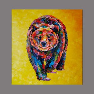 May include: A colorful painting of a bear walking forward, with a yellow background. The bear is painted with a variety of colors, including red, orange, blue, and green. The artwork is a square canvas.