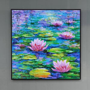 May include: Square framed oil painting of a pond scene with pink water lilies and lily pads. The water is a mix of blues and greens, with the lilies in full bloom. The painting has a textured, impressionistic style.