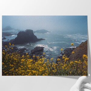 Nature Enthusiast Seascape Picture Misty Water Scene Rocky Formation Yellow Wildflowers Oregon Coast Print Framed Photography Wall Art Ocean Landscape Beach House Living Room Nautical Design Coastal Home Office Gift Foggy Atmosphere Blue
