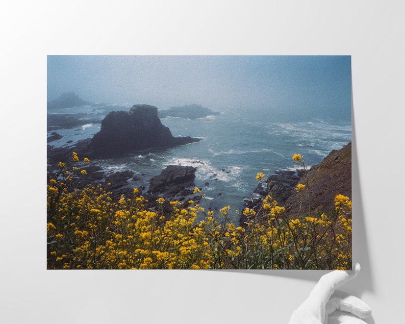 Nature Enthusiast Seascape Picture Misty Water Scene Rocky Formation Yellow Wildflowers Oregon Coast Print Framed Photography Wall Art Ocean Landscape Beach House Living Room Nautical Design Coastal Home Office Gift Foggy Atmosphere Blue