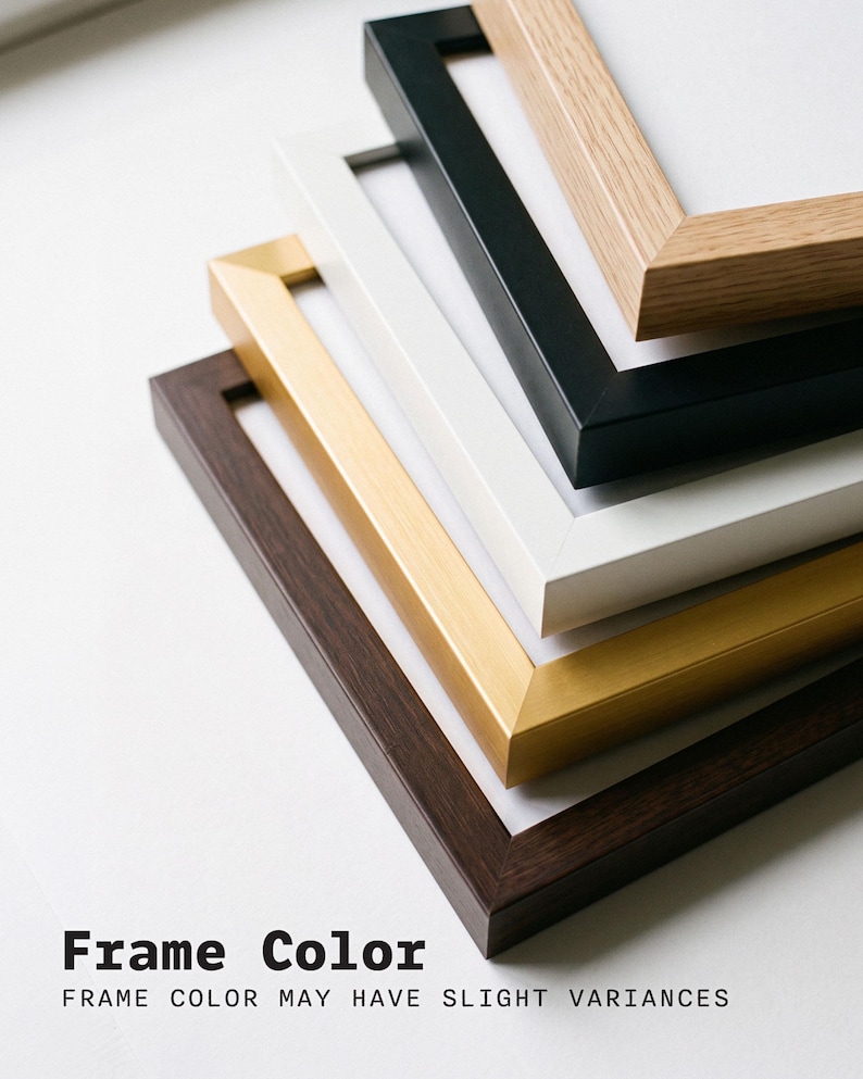 May include: A stack of five rectangular picture frames in varying finishes including light wood grain, matte black, white, metallic gold, and dark wood grain. The text Frame Color and FRAME COLOR MAY HAVE SLIGHT VARIANCES is printed below.