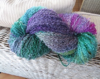 290 grams hand dyed mohair yarn.  Beautiful colours. Suitable for knitting crochet weaving felting.