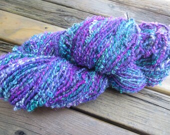 300 grams hand dyed hand spun merino and mohair art yarn. Suitable for knitting crochet felting weaving