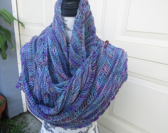 Beautifully hand knitted with 4ply wool  large triangular shape shawl/ wrap.  Casual shawl/wrap.  Elegant evening shawl.  Warm and cozy wrap