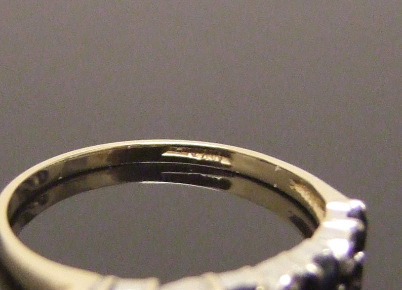 9 Carat hallmarked gold sapphire and diamond ring Size UK L 12 USA 6