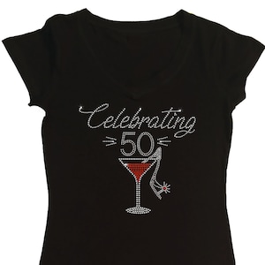 May include: Black t-shirt with a rhinestone design that says "Celebrating 50" with a martini glass and a red high heel shoe.