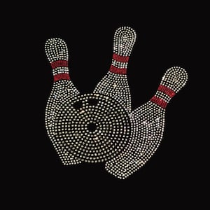 May include: Three silver bowling pins with red stripes, arranged in a triangle shape, with a silver bowling ball in the center.