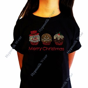 May include: Black t-shirt with a rhinestone design of three Christmas cupcakes and the text "Merry Christmas".