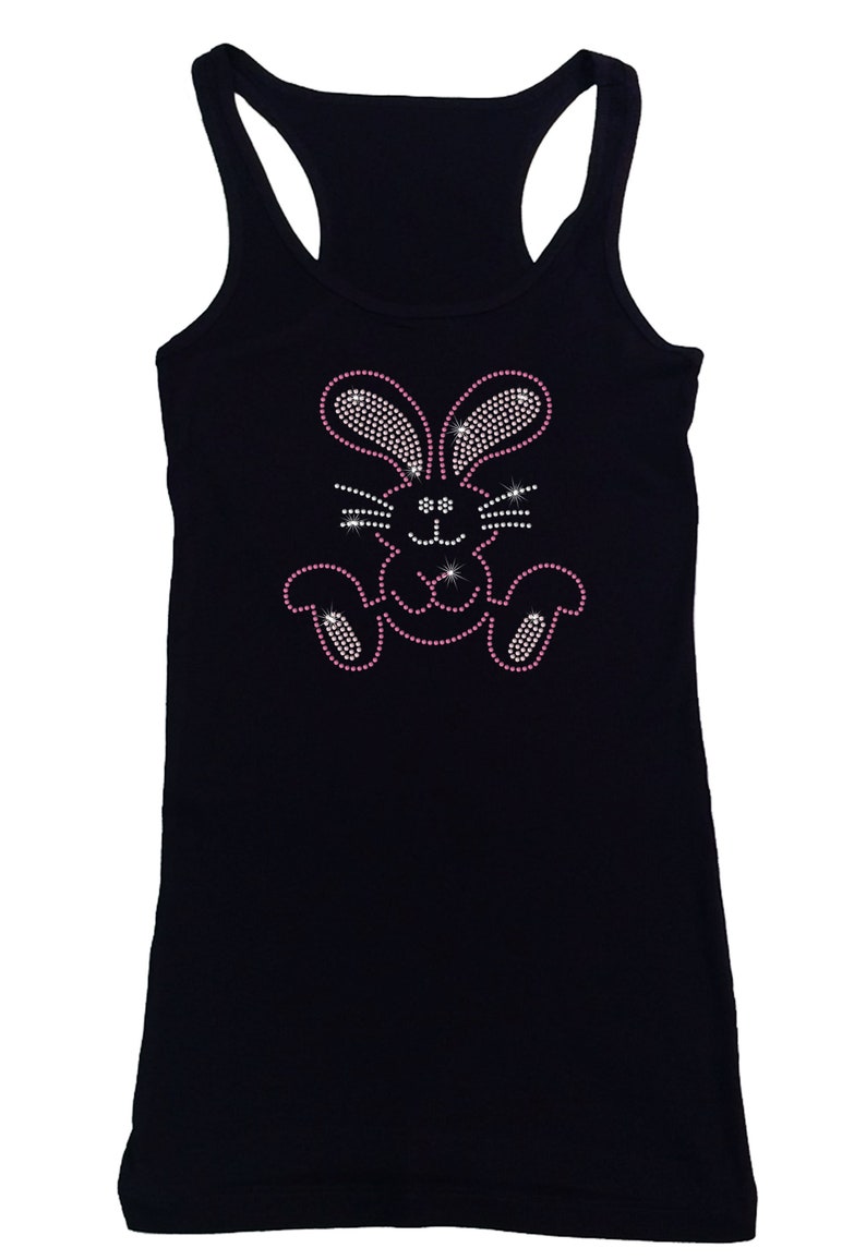 May include: Black tank top with a pink rhinestone bunny design.