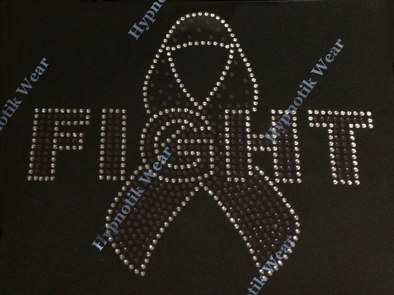 May include: A black t-shirt with a rhinestone design of a ribbon and the word "FIGHT".