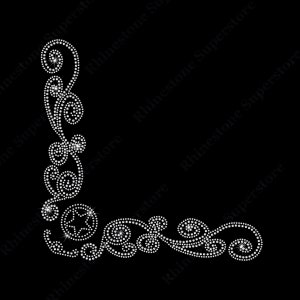 May include: A corner design made of clear rhinestones in a swirling pattern. The design is perfect for adding a touch of sparkle to any project.