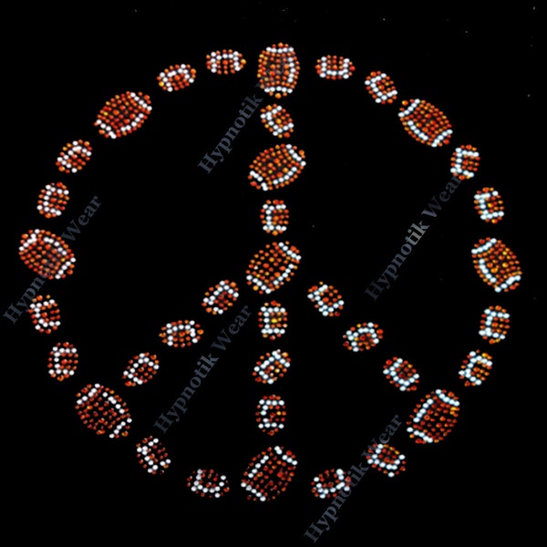May include: Peace sign made of brown and white footballs. The footballs are made of rhinestones. The peace sign is on a black background.