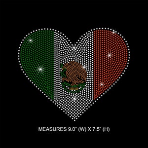 May include: A heart-shaped rhinestone design featuring the Mexican flag colors of green, white, and red. The center of the heart includes the Mexican coat of arms.  MEASURES 9.0" (W) X 7.5" (H)