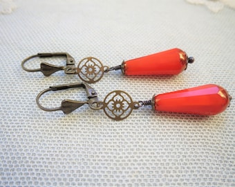 Art Deco Style Earrings with Red Czech Glass Teardrop Beads and Openwork Flower Disc Detail in Antique Bronze, Available in Clip Ons