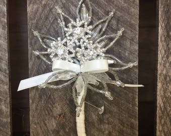 Snowflake corsage, snowflake boutonniere, buttonholes, mother of the bride, grooms, ushers.
