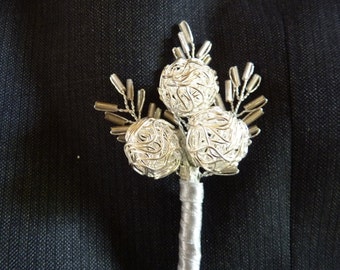 Modern silver wire bauble buttonhole, boutonniere for groom, best man, ushers, father of the bride with silverribbon and seed bead leaves.