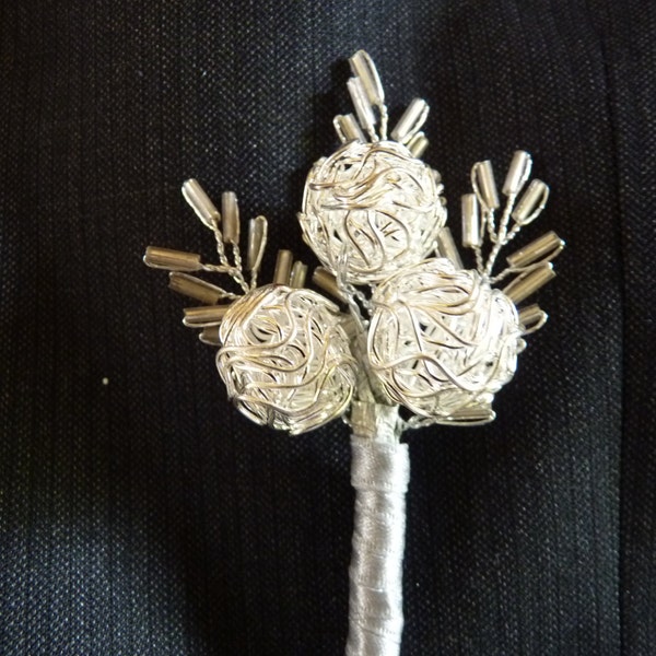 Modern silver wire bauble buttonhole, boutonniere for groom, best man, ushers, father of the bride with silverribbon and seed bead leaves.