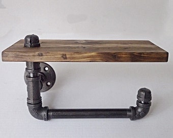 Industrial pipe single flange hand towel rack with wood shelf.