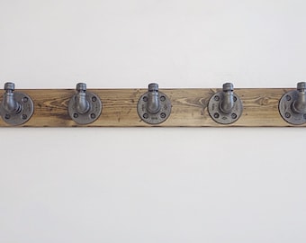 Industrial Pipe Row of Hooks