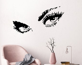 May include: Black and white illustration of a pair of eyes with long eyelashes. The eyes are looking directly at the viewer.