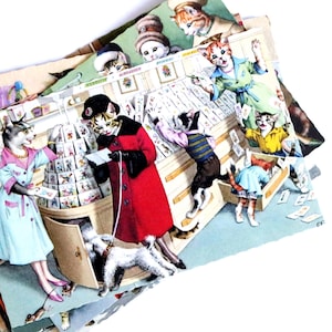 May include: A stack of vintage postcards featuring anthropomorphic cats in a shop setting. The cats are dressed in human clothing, interacting with each other and browsing cards. The color palette includes red, blue, and pink.