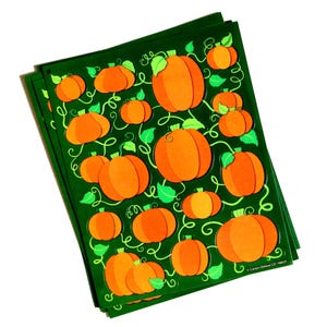 May include: A stack of dark green sheets featuring a repeating pattern of orange pumpkins with light green leaves and swirling vines. The bottom right corner of the sheets displays the printed text Carson-Dellosa CD-168025.