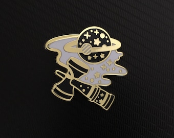 Japanese Space toy kantama. Black and white with gold enamel pin