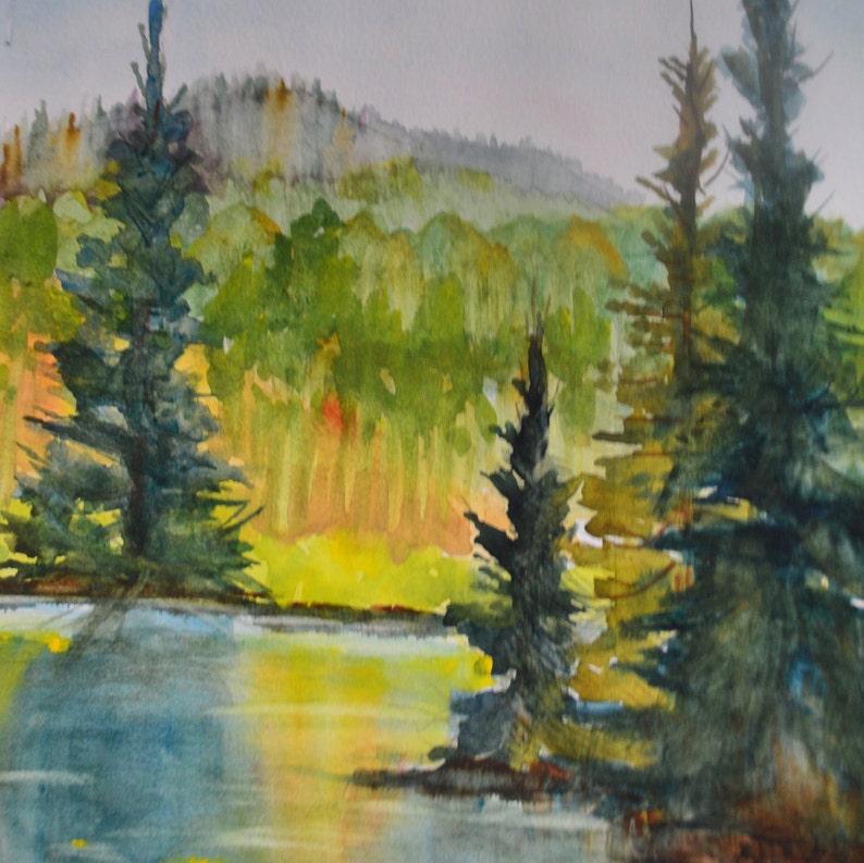 "Spruce Point ", is a colorful autumn painting. The reflections in the lake were magical, with bright yellows and blue green.

The spruce trees on the point and the middle ground are a rich blue green.