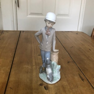 Nao Lladro &quot;Affectionate Pup&quot; Boy with Dog Figurine