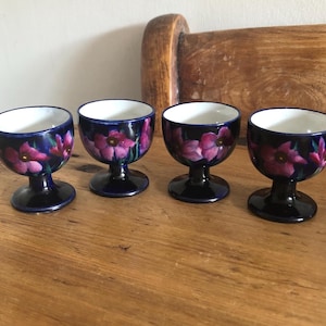 A Beautiful Set of Four George Jones and Sons, Imperial Rouge, Egg Cups