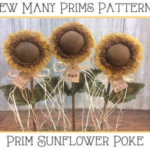 May include: Three handcrafted prim sunflower pokes with brown centres and yellow and brown petals. Each sunflower has a tag that reads "Farm Grown" or "Sunflower Fields". The text "Sew Many Prims Patterns" and "Prim Sunflower Poke" are also visible.