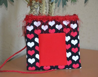 Valentine anywhere bag with fringe trim, pocket for cell phone, credit cards, make up, keys, brush-be the envy of your friends