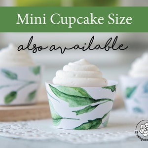 May include: Mini cupcake cases filled with white frosting. The cases feature a white background and green watercolour leaf patterns. The text "Mini Cupcake Size" is at the top, with "also available" below. The Greengate Images logo is in the bottom right.