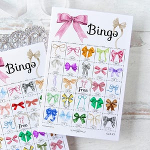 Bingo de Lazos - 50 cartones únicos para IMPRIMIR. Descarga digital instantánea en PDF. Una divertida idea de juego/actividad para fiestas y eventos con temática de lazos o cintas.