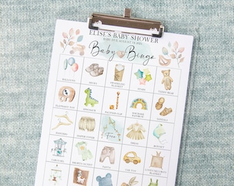 May include: A baby shower bingo card with illustrations of baby items such as a teddy bear, pacifier, shoes, and a swaddling blanket. The text on the card reads "Elise's Baby Shower, Baby Due August 14, 2021, Baby Bingo".