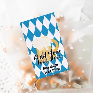 May include: Blue and white diamond patterned gift tag with a cartoon illustration of a beer stein. The tag says "Add your text here" and "Add more text here".