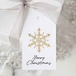 Gold Snowflake Geschenkanhänger - DRUCKBARE Vorlage, die Sie auf der Corjl-Website bearbeiten. Schlicht, minimalistisch, Taschenanhänger. Ideen für eine Winterhochzeit.