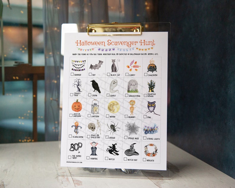 May include: A printable Halloween scavenger hunt checklist with illustrations of common Halloween decorations, including a banner, bat, black cat, candy, cauldron, crow, ghost, gravestone, haunted house, jack-o-lantern, lantern, moon, mummy, owl, scarecrow, skeleton, spider, spider web, string lights, the word "boo", vampire, witch, witch hat, and wreath.