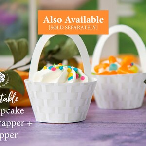 May include: Printable cupcake wrapper and topper with a basket design. The cupcake is topped with white frosting and colorful sprinkles. The text "Also Available [SOLD SEPARATELY]" is on a green background.