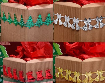 EMBOSSED CHRISTMAS RIBBON 2m x 25mm red stcokings, christmas trees, gold bells & silver bells. Traditional christmas decorations in a ribbon