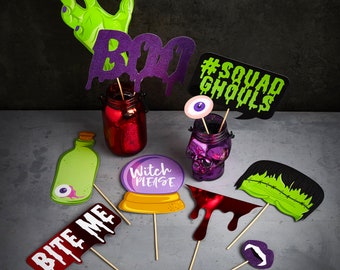 FABULOUSLY CREEPY HALLOWEEN photo booth props for a spoktackular halloween bash eyeballs and vampire teeth mummies and zombies are all here