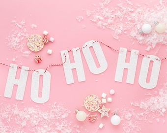 HO HO HO white irridescent acrylic ideal for a christmas or new year's eve party approx 1 meter 3ft strung on a red and white cord    long
