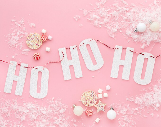 HO HO HO white irridescent acrylic ideal for a christmas or new year's eve party approx 1 meter 3ft strung on a red and white cord    long