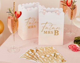 Chic gold and white & pink bridal shower party gift bags. and gold foiling stickers to personalise and pink ribbon handles