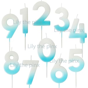 May include: A set of ombre blue and white number candles, each with a wick. Numbers 0 to 9 are shown. The text "Lily the pinx" is printed on the image.