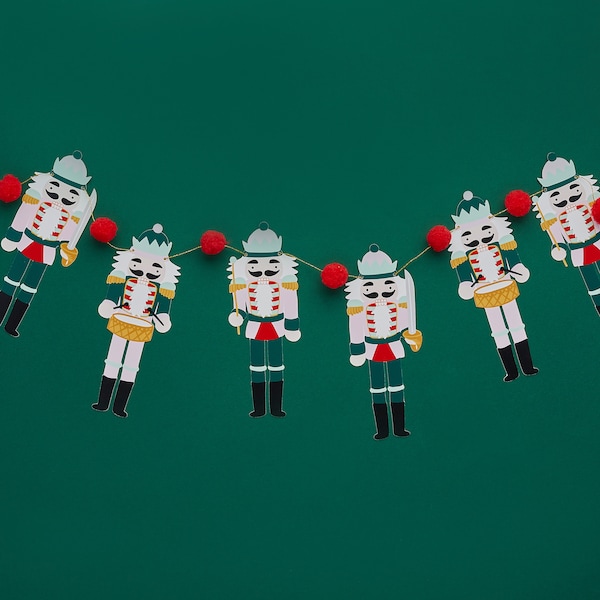 Guirlande de pompons soldat casse-noisette de Noël aux couleurs traditionnelles de Noël rouge blanc vert et or 2 mètres