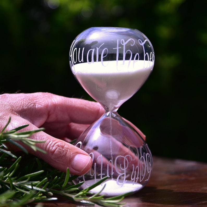 glass sand timer hand engraved with any message of your choice in a calligraphy font