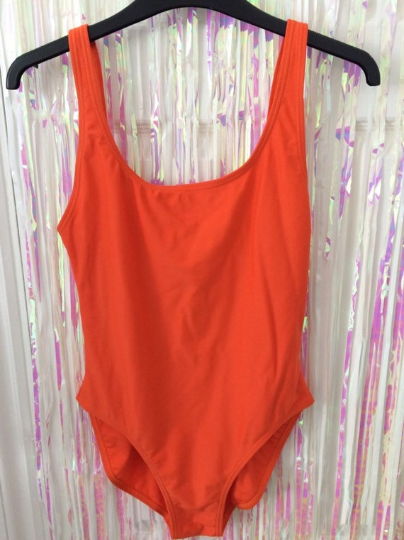 bright orange swimsuit