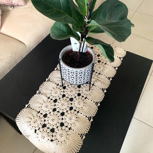 May include: A set of three ceramic mugs with a speckled, matte finish in cream, light grey, and dark grey. Each mug has a simple, modern design and a rounded handle.